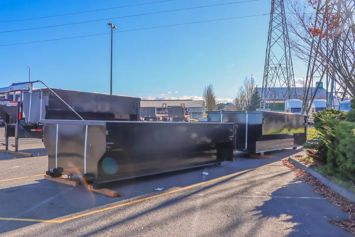 Roll-off dumpster ready for waste disposal at job site for 2 Yard Dumpster Rental in South Berwick